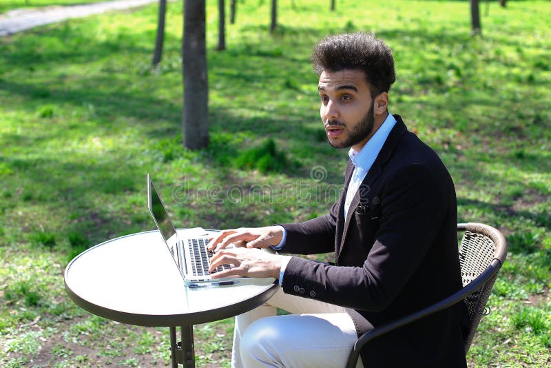 Journalist finished work in park stock images