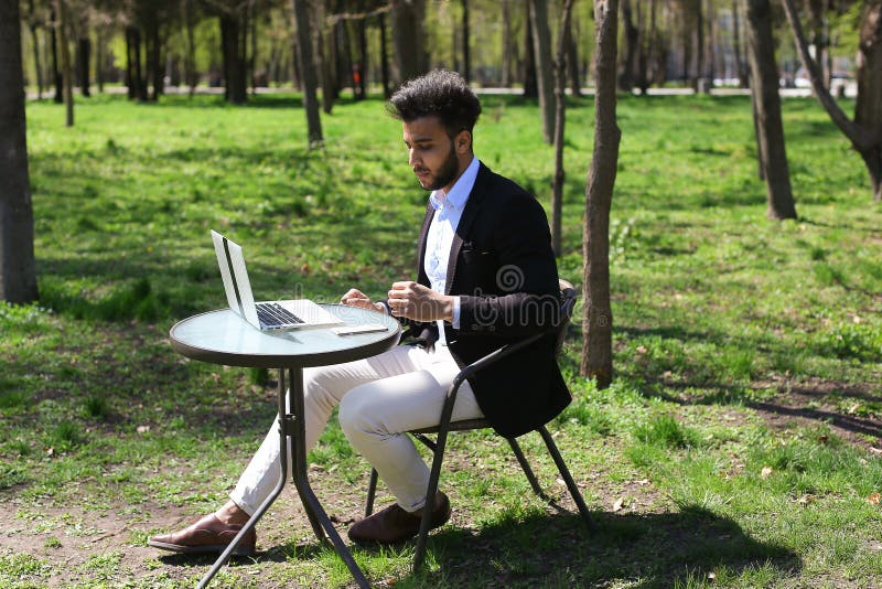 Journalist finished work in park royalty free stock photo