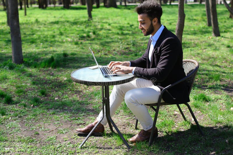 Journalist finished work in park stock photography