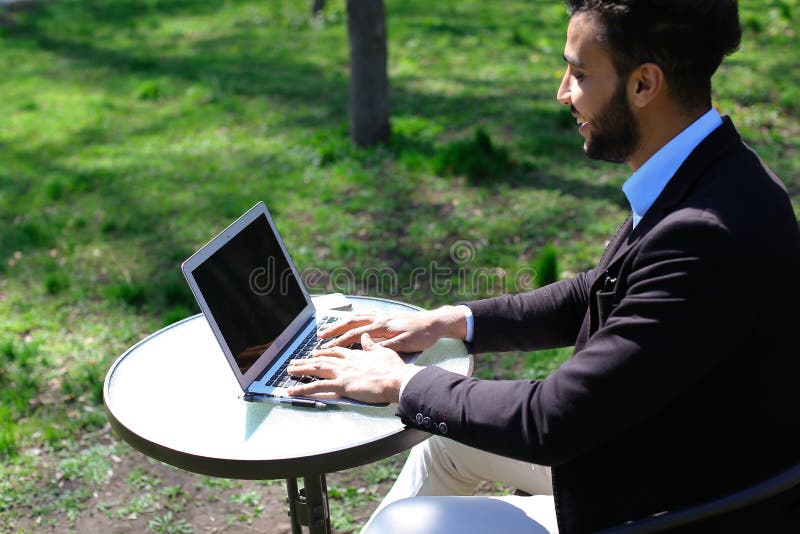 Journalist finished work in park stock photography
