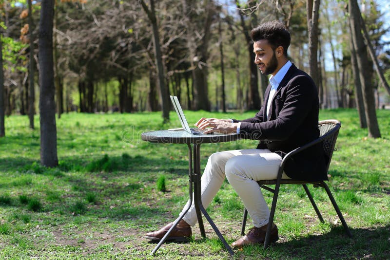 Journalist finished work in park royalty free stock images