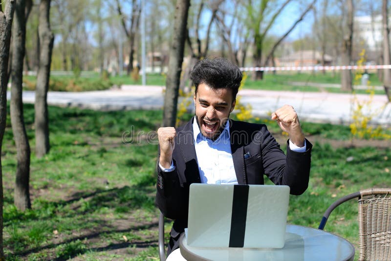 Journalist finished work in park stock photo
