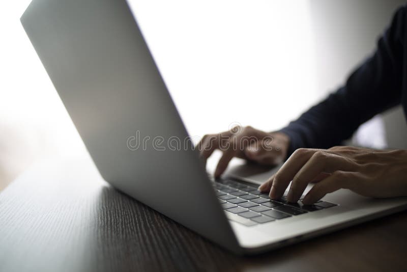 Person are using laptops, working or studying online at home. businessman using laptop work outside the office stock photography