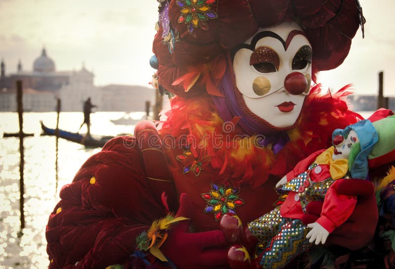 Person in Venice Carnival Mask Stock Photo - Image of boats, holds: 29179592