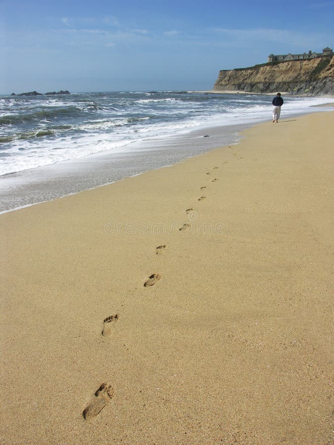 Person walking on beach royalty free stock photos Person walking on beach royalty free stock photos