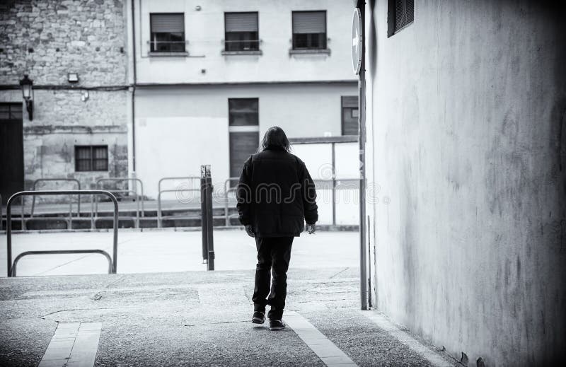 Person walking on street royalty free stock photography