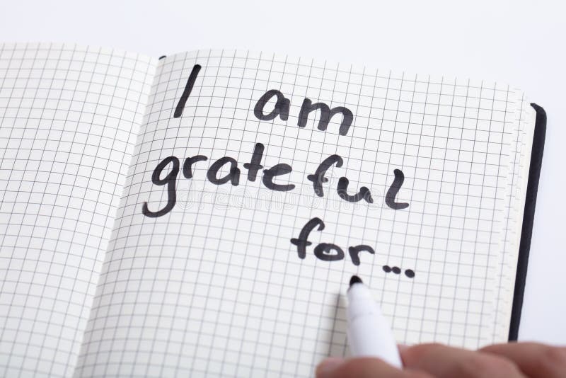 Person Writing I Am Grateful For Text stock images