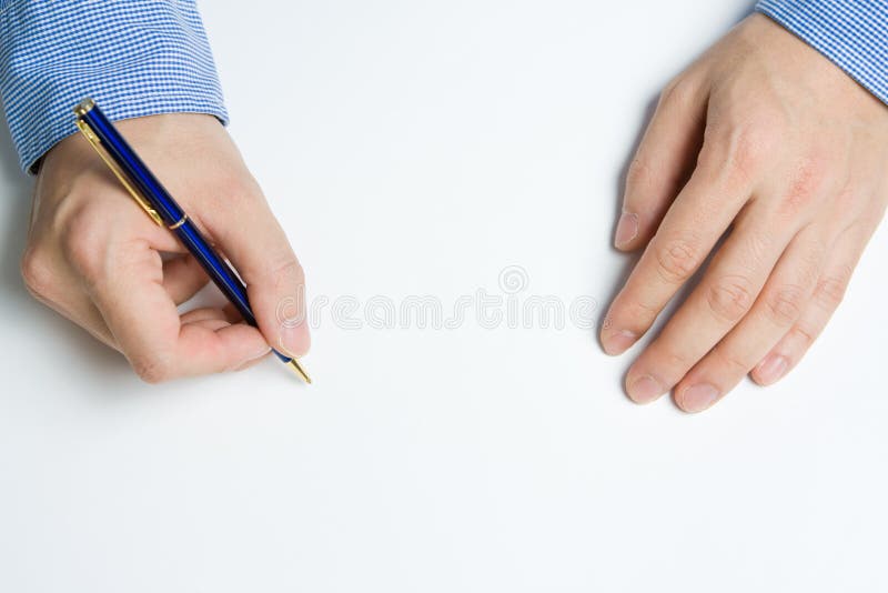 Person writing on paper royalty free stock image