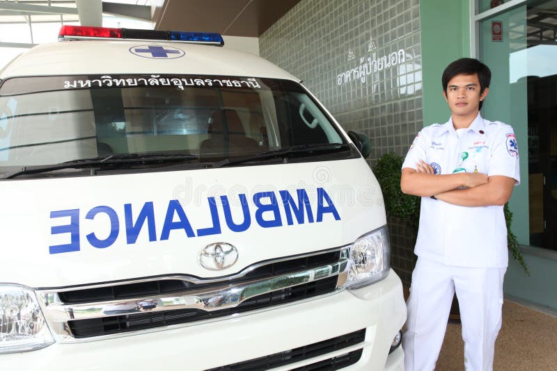 UBON RATCHATHANI, THAILAND â€“ AUG 7, 2013 : Pornchai Kaotong a member of emergency rescues team and his ambulance car on Aug 7, 2013 in Ubon Ratchathani University hospital, Warinchamrab, Ubon Ratchathani, Thailand. UBON RATCHATHANI, THAILAND â€“ AUG 7, 2013 : Pornchai Kaotong a member of emergency rescues team and his ambulance car on Aug 7, 2013 in Ubon Ratchathani University hospital, Warinchamrab, Ubon Ratchathani, Thailand.