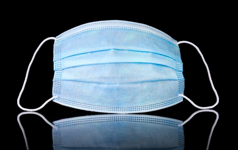 Personal Protective Equipment, PPE, Medical Face Mask on Black Stock