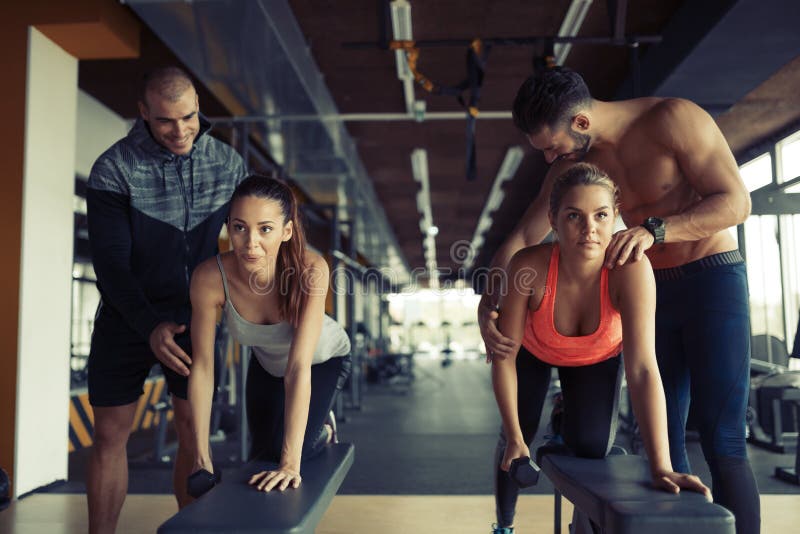 Personal Trainer Giving Instructions in Gym Stock Image Image of care