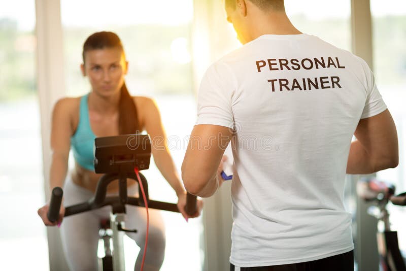Personal trainer at the gym royalty free stock photos Personal trainer at the gym royalty free stock photos