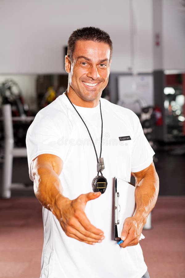 Personal trainer hand shake royalty free stock photography