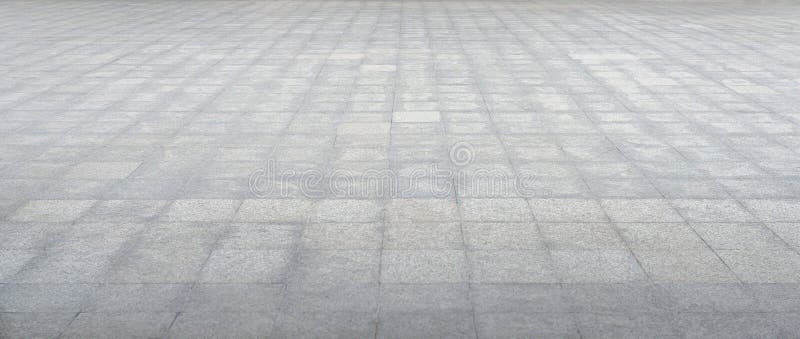 Perspective of stone brick blocks floor road spacious texture for background royalty free stock photo