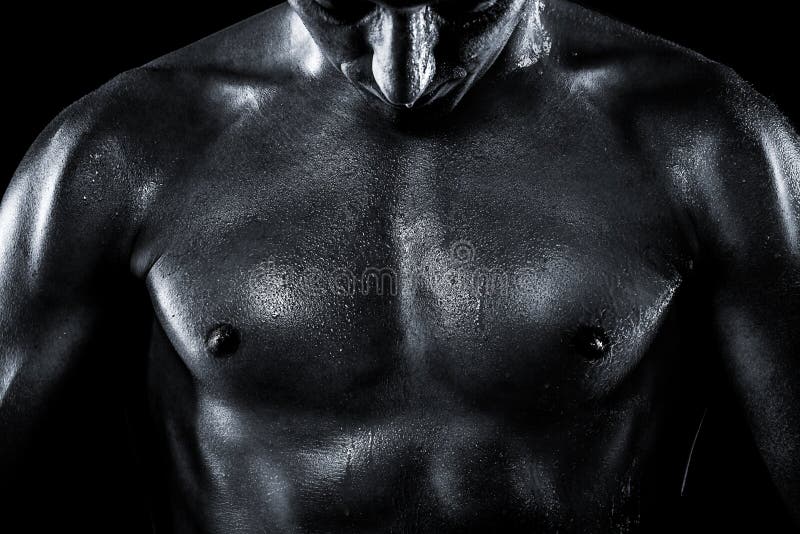 Perspiring part of the men body on a black backgro