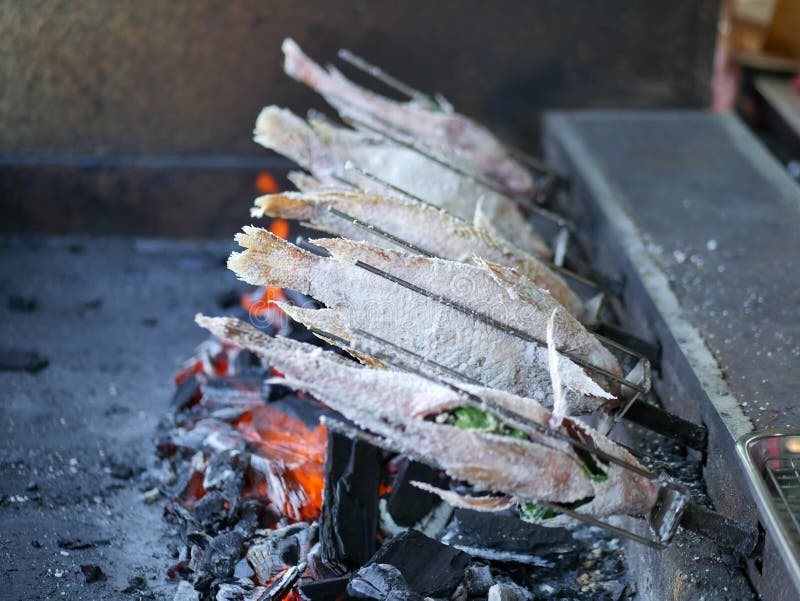 Pesce arrostito Sale-crostoso fotografie stock Pesce arrostito Sale-crostoso fotografie stock