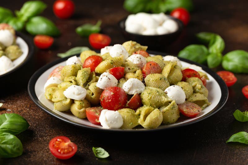 Pesto Pasta Salad with Cherry Tomatoes and Mozzarella Cheese. Healthy ...