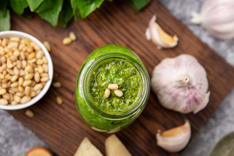 Pesto Sauce in a Bottle with Ingredients Stock Photo Image of garlic