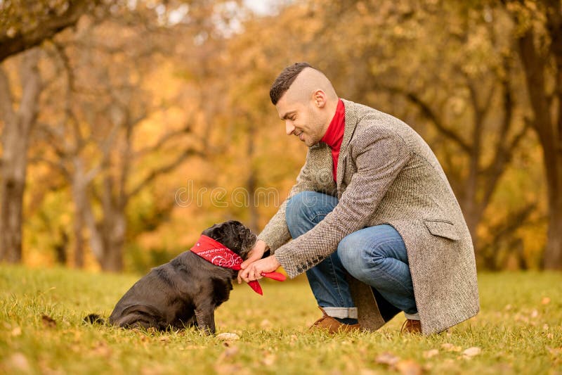A Pet Owner on the Walk with His Friend Stock Photo Image of fall