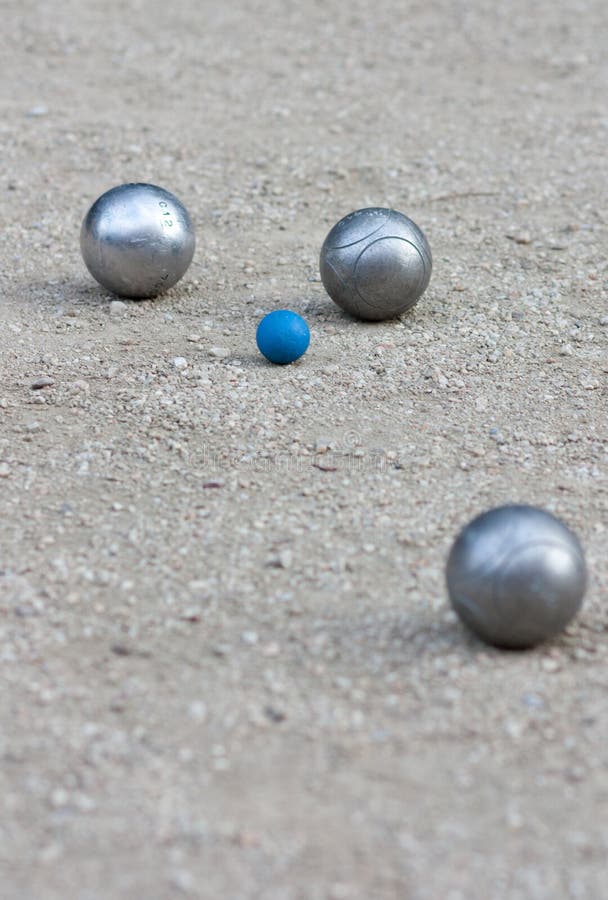 Petanque Balls with a Jack (cochonnet) Stock Photo - Image of