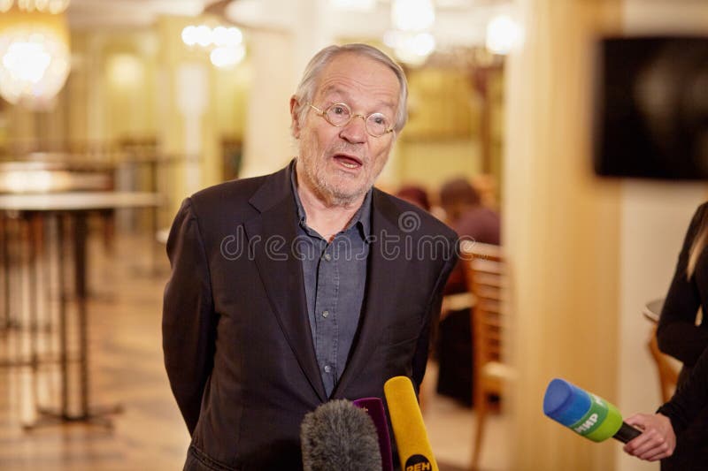 MOSCOW, RUSSIA - JAN 15, 2015: Peter Stein stage director of play Boris Godunov talk to journalists during interview after media preview at foyer of Moscow theatre Et Cetera. MOSCOW, RUSSIA - JAN 15, 2015: Peter Stein stage director of play Boris Godunov talk to journalists during interview after media preview at foyer of Moscow theatre Et Cetera