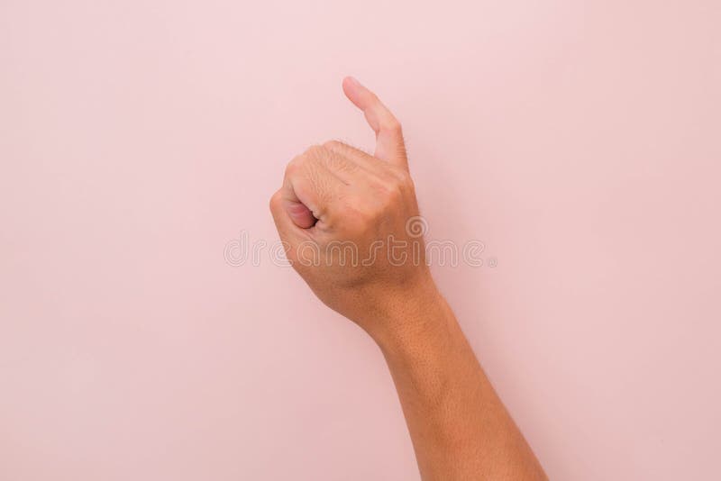 Little finger of male hand against pink background,meaning reconciliation. keeping promise sign. Little finger of male hand against pink background,meaning reconciliation. keeping promise sign.