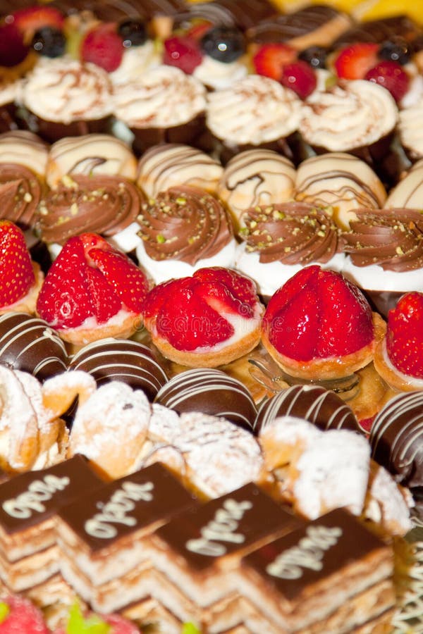 Colourful Petit Fours on a Cake Stand with Bokeh Stock Image - Image of ...