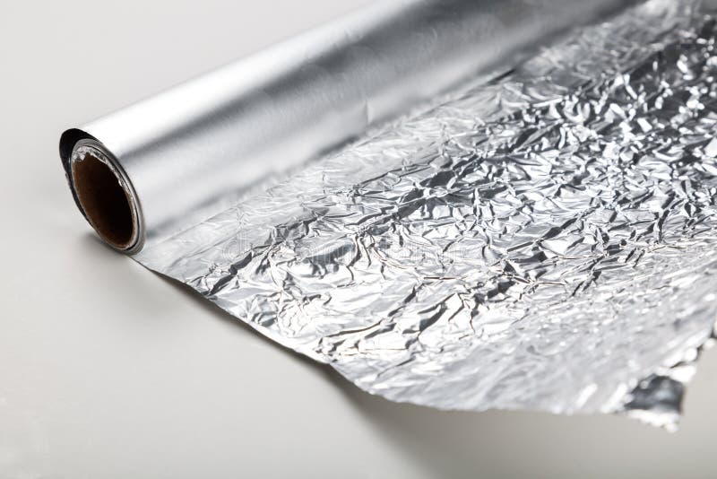 Petit pain de papier d'aluminium images stock Petit pain de papier d'aluminium images stock