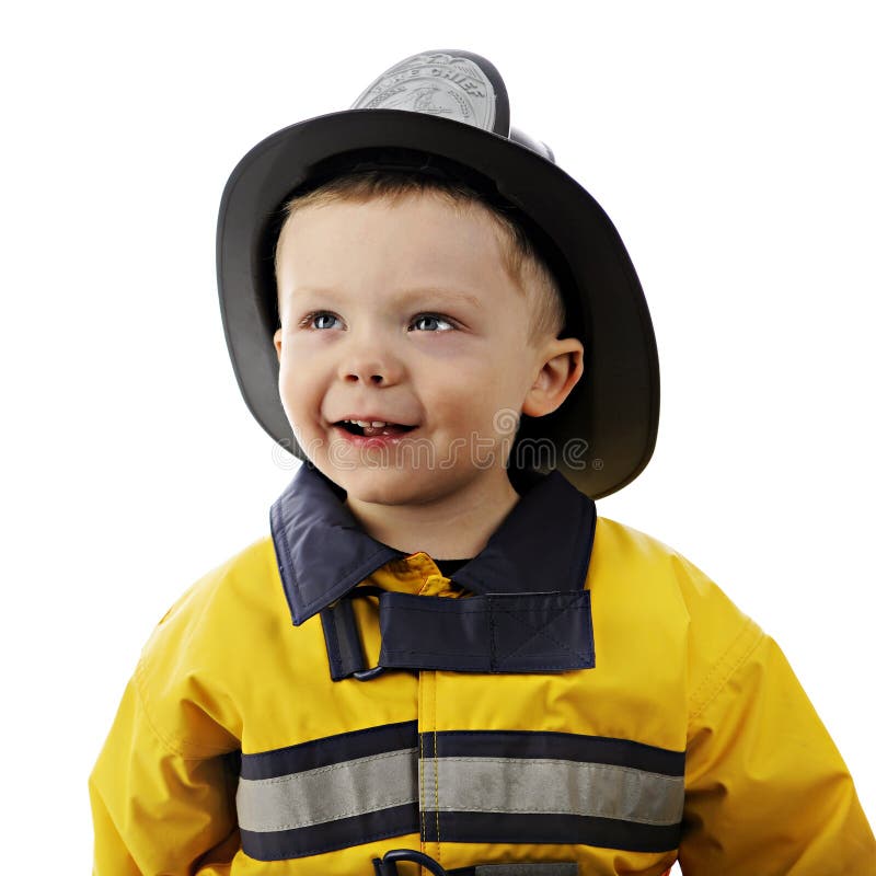 Close-up portrait of an adorable 2-year-old in his fireman's outfit. On a white background. Close-up portrait of an adorable 2-year-old in his fireman's outfit. On a white background.