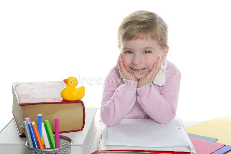 Petit sourire blond de fille d'étudiant photographie stock libre de droits Petit sourire blond de fille d'étudiant photographie stock libre de droits
