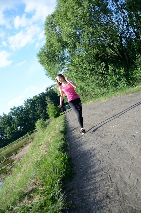 Petite Female Running in the Forest Stock Photo - Image of petite, woman:  120178094