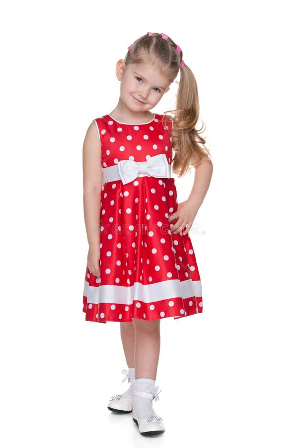 Petite Fille Dans La Jupe Rouge Photo stock - Image du enfant