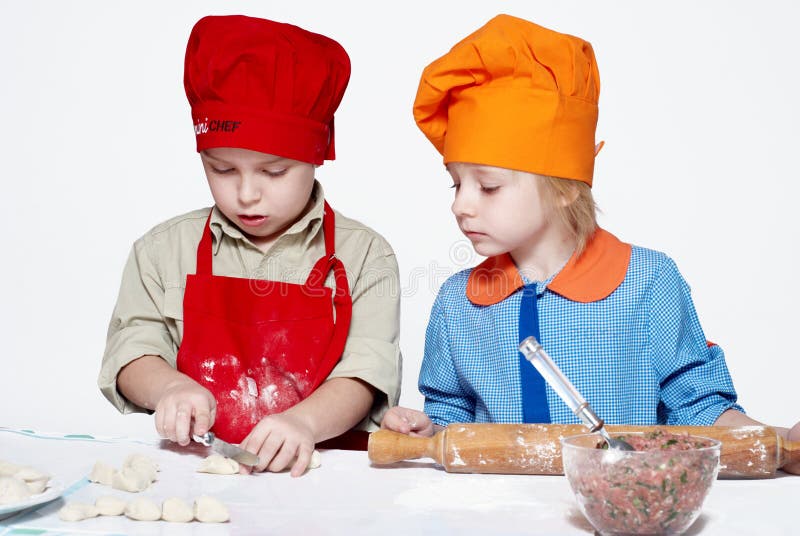 Petit Heureux De Cuisinier Attirant Photo stock Image du expression