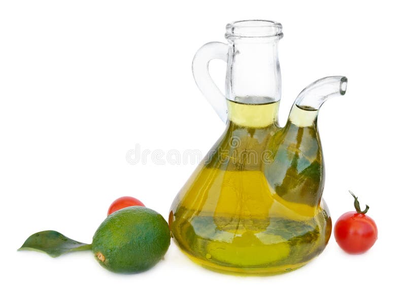 Petróleo verde-oliva e tomates fotografia de stock royalty free Petróleo verde-oliva e tomates fotografia de stock royalty free