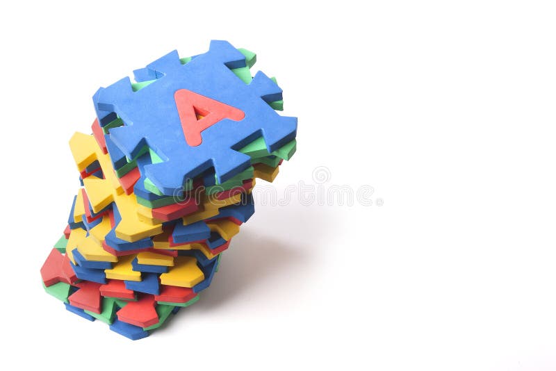 Pezzi di puzzle di alfabeto fotografie stock libere da diritti