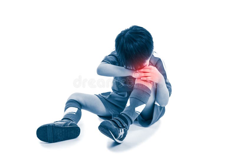 Sports injury. Full body of asian soccer player painful. Child crying and touching his knee, isolated on white background. Photo with color increase blue skin and red spot indicating location of pain. Sports injury. Full body of asian soccer player painful. Child crying and touching his knee, isolated on white background. Photo with color increase blue skin and red spot indicating location of pain.