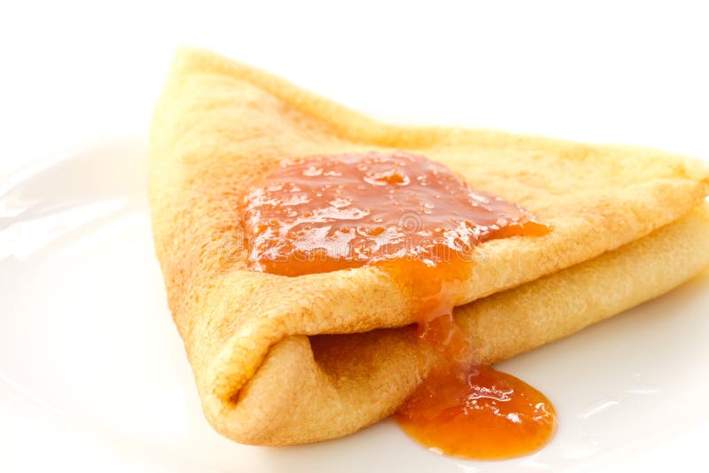 Pfannkuchen mit Aprikosenmarmelade lizenzfreies stockfoto Pfannkuchen mit Aprikosenmarmelade lizenzfreies stockfoto