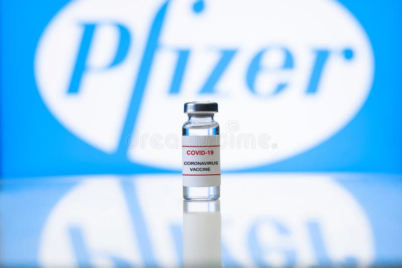 Pfizer vaccine. Vial of covid-19 vaccine, background logo of the American pharmaceutical company Pfizer.