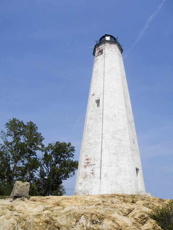 Phare au point de phare photos libres de droits Phare au point de phare photos libres de droits