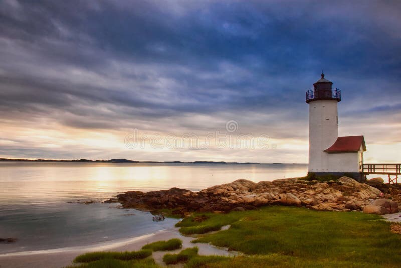 Historic Annisquam Lighthouse in Gloucester, MA at sunset. Historic Annisquam Lighthouse in Gloucester, MA at sunset.