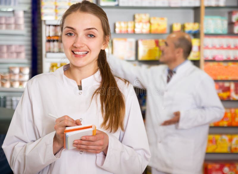 Pharmacist and Pharmacy Technician in Drugstore Stock Photo Image of