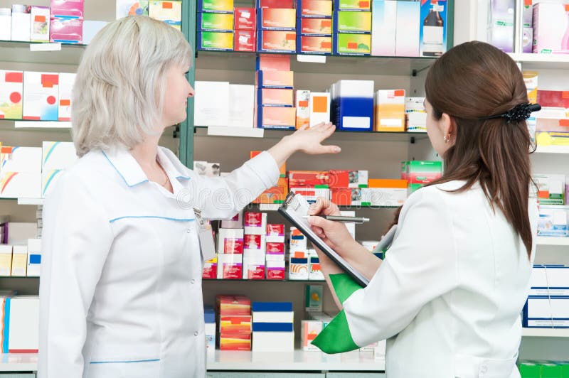 Pharmacy Chemist Women in Drugstore Stock Photo - Image of people ...