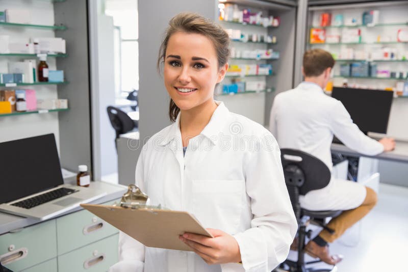Pharmacy Intern Smiling at Camera Stock Image Image of woman, indoors