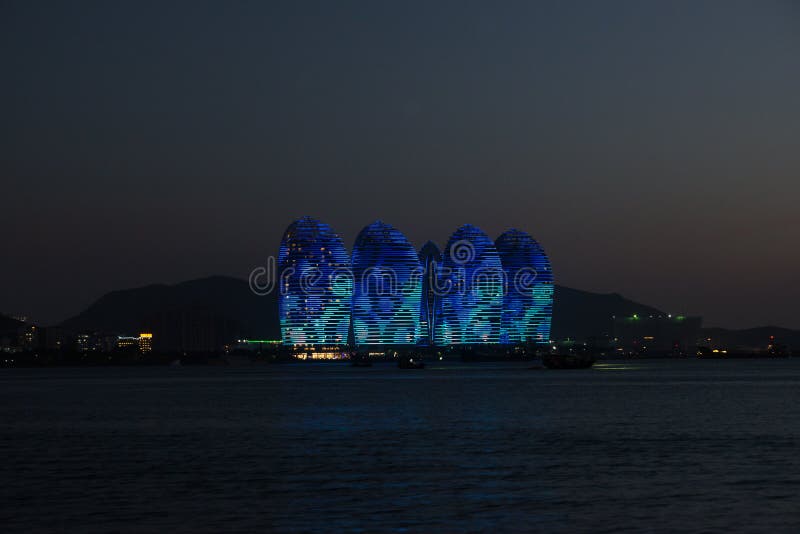 Pheonix Island Sanya, illuminated buildings. Unique modern design stock photo Pheonix Island Sanya, illuminated buildings. Unique modern design stock photo