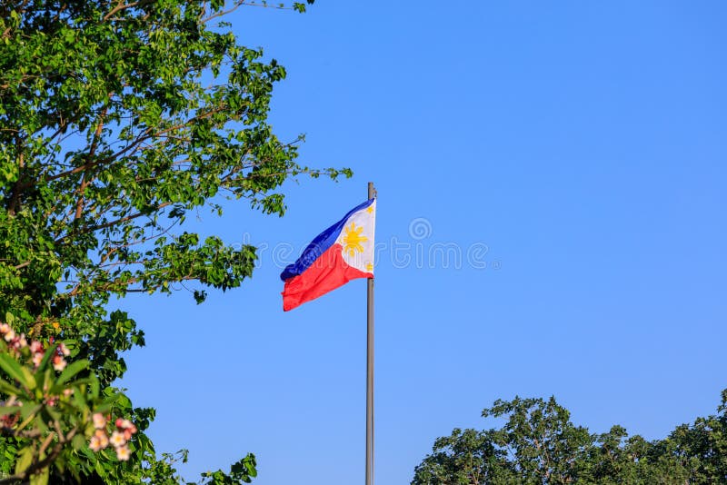Philippine flag on blue sky