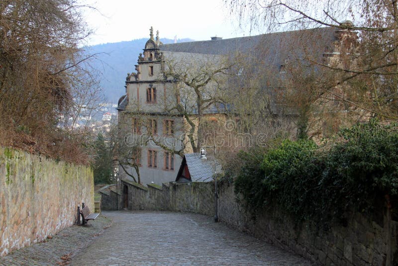 Philipps University Religious Studies Collection, former Landgrave's New Chancellery, view from old cobblestone street descending from the Castle, Marburg, Germany - January 29, 2023. Philipps University Religious Studies Collection, former Landgrave's New Chancellery, view from old cobblestone street descending from the Castle, Marburg, Germany - January 29, 2023