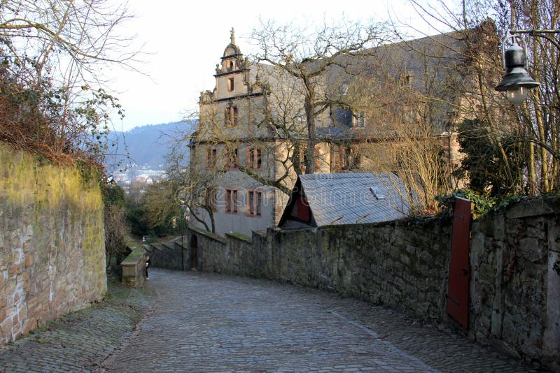 Philipps University Religious Studies Collection, former Landgrave's New Chancellery, view from old cobblestone street descending from the Castle, Marburg, Germany - January 29, 2023. Philipps University Religious Studies Collection, former Landgrave's New Chancellery, view from old cobblestone street descending from the Castle, Marburg, Germany - January 29, 2023