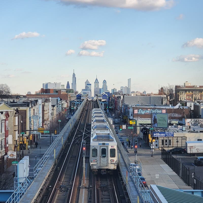 Philly El Train with and Urban Back Drop. Editorial Stock Photo Image