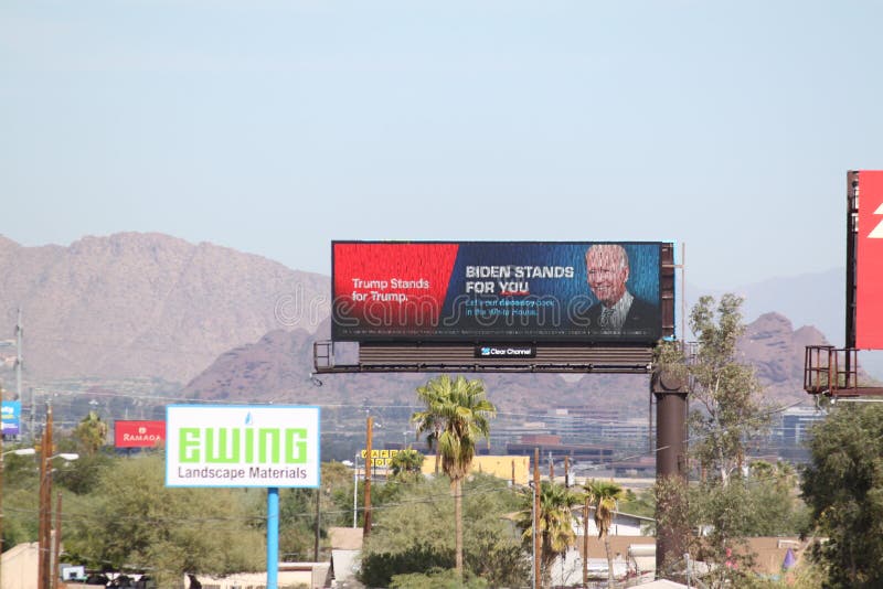 Phoenix, Ariz. / USA - October 31, 2020: Billboards urge people to vote for presidential candidate Joe Biden, with running mate Kamala Harris, in the 2020 election. Phoenix, Ariz. / USA - October 31, 2020: Billboards urge people to vote for presidential candidate Joe Biden, with running mate Kamala Harris, in the 2020 election