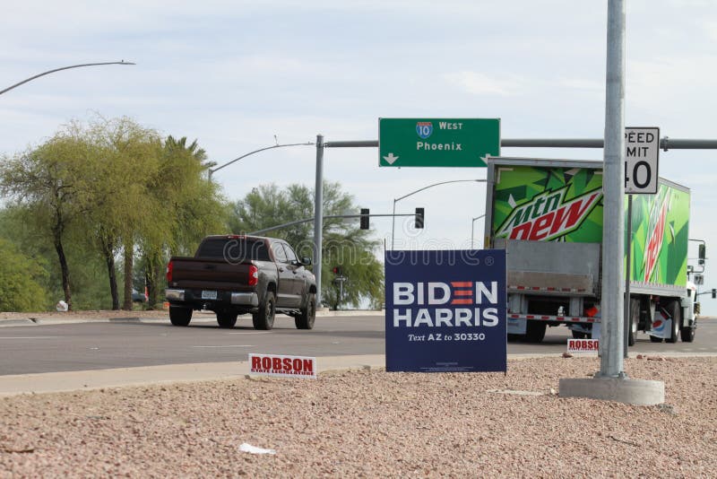 Phoenix, Ariz. / USA - October 31, 2020: Signs in Awaktukee Foothills neighborhood urge people to vote for presidential candidate Joe Biden, with running mate Kamala Harris, in the 2020 election. Phoenix, Ariz. / USA - October 31, 2020: Signs in Awaktukee Foothills neighborhood urge people to vote for presidential candidate Joe Biden, with running mate Kamala Harris, in the 2020 election